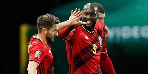 Belgium's Dries Mertens (L) celebrates with teammate Romelu Lukaku after scoring during the UEFA Nations League match against England at the King Power stadium in Leuven. (Photo | AP)