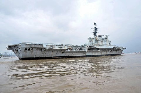 INS Viraat during its last journey from Naval Dockyard to Alang in Gujarat where it will be dismantled in Mumbai Saturday Sept. 19 2020. (Photo | PTI)