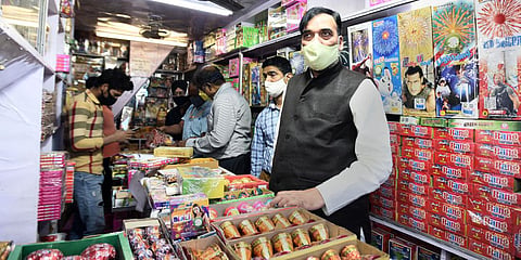 Delhi Environment minister Gopal Rai inspects cracker shops at Nai Sarak in New Delhi. (Photo| Parveen Negi, EPS)