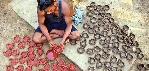 A potter making clay lamps at Basantpur. (Photo| EPS)