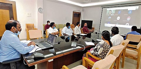 Tirupattur Collector MP Sivanarul interacting with officials of DGFT and trade representatives. (Photo | Express)