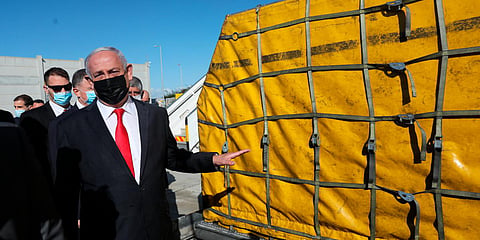 Israeli PM Benjamin Netanyahu attends the arrival of over 100,000 of doses of the Pfizer coronavirus vaccines at the Ben Gurion Airport near Tel Aviv. (File photo| AP)