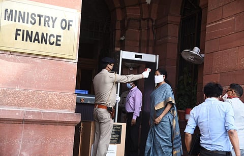 Finance Minister Nirmala Sitharaman being checked at the Finance Ministry entrance. (Photo | EPS/Parveen Negi)