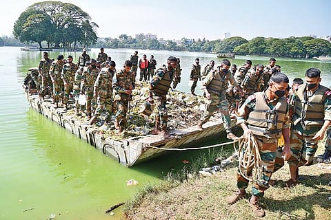Madras Engineering Group and Centre personnel haul a load of trash fished out from Ulsoor Lake on Saturday | Shriram BN