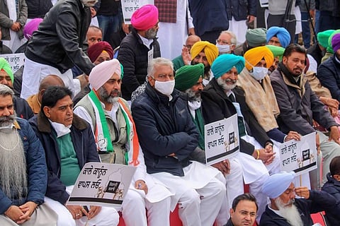Punjab Finance Minister Manpreet Singh Badal along with other leaders take part in a farmer's protest. (Photo | PTI)