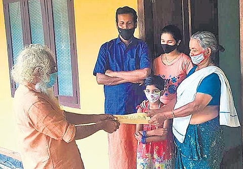  Babu John, the CPM candidate who contested and won from ward 1 of Ezhamkulam panchayat in Adoor, during his election campaign.