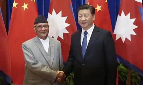 Chinese President Xi Jinping with Nepalese Prime Minister K.P. Sharma Oli (File Photo | AFP)