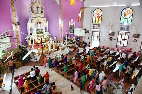 People attend christmas prayer at Sacred Heart Shrine, Egmore, in Chennai. (Photo | R Satish babu, EPS)