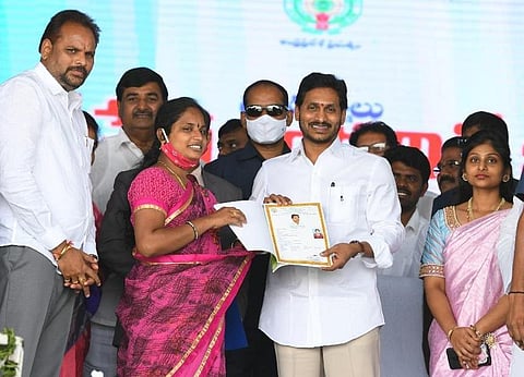 CM YS Jagan Mohan Reddy during the distribution of house site pattas at Gunkalam of Vizayanagaram district on Wednesday. (Photo | EPS)