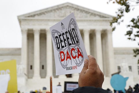 people rally outside the Supreme Court as oral arguments are heard in the case of President Trump's decision to end the Obama-era, Deferred Action for Childhood Arrivals program (DACA). (Photo | AP)