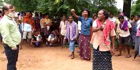 Agitated tribals explaining to an official why they don't want Christians to live in their area  in Kondagaon district (Photo | Israr Ahmed)