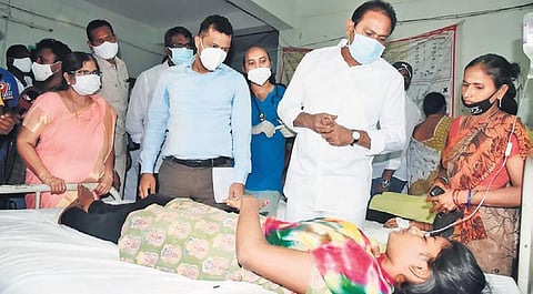 Deputy Chief Minister (Health) Alla Kali Krishna Srinivas (Nani) enquires about the condition of patients at GGH in Eluru on Saturday  | Express