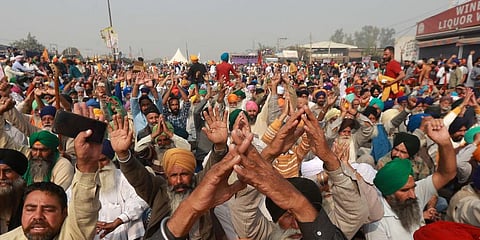 Farmers shouting slogans during their Delhi Chalo protest march against the new farm laws at Singhu border in New Delhi. (Photo | Shekhar Yadav, EPS)