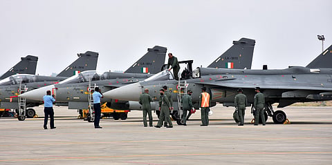 The Chief of the Air Staff Air Chief Marshal RKS Bhadauria getting down after flying the LCA Tejas MK-1 Initial Operational Clearance IOC fighter aircraft with No.45 Squadron Flying Daggers at Sulur A