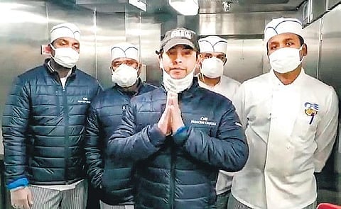 Binay Kumar Sarkar (R) along with other Indian crew members in a SOS video on the quarantined cruise liner Diamond Princess (Photo |  PTI)