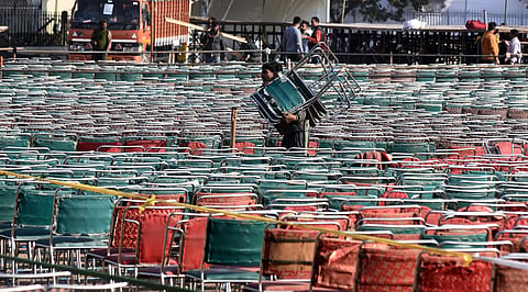 Workers arrange chairs as they prepare Ramlila Maidan for the oath-taking ceremony of Aam Aadmi Party (AAP) government in New Delhi on Friday Feb. 14 2020.  (Photo | Parveen Negi/EPS)