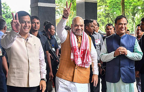 Union Home Minister Amit Shah with Assam Chief Minister Sarbananda Sonowal and Finance Minister of Assam Himanta Biswa Sarma. (File Photo | PTI)