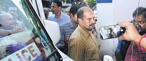 One of the six former officers of Nedumkandam police station being brought to the Ernakulam Chief Judicial Magistrate Court on Tuesday | A Sanesh