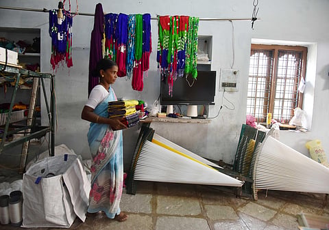 A Pochampally hand loom weaver at work. (File Photo | S Senbagapandiyan, EPS)