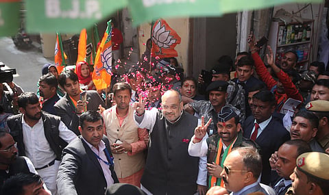 Union Home Minister Amit Shah during the door to door campaign under 'Maha Jan Sampark Abhiyan' in Old Mehram Nagar in New Delhi  (Photo | Shekhar Yadav, EPS)