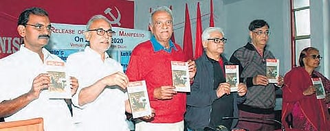 Left party leaders K Narayana and B Raghavulu at the Red Book Day programme  organised at the CPI office in New Delhi on Friday