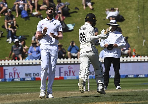 Ishant Sharma watches on as New Zealand's Tom Blundell runs through for New Zealand to defeat India by ten wickets at the Basin Reserve in Wellington. (Photo| AP)