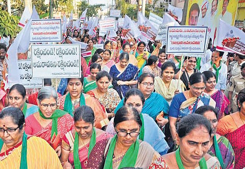 Members of the Amaravati Parirakshana JAC take out a protest rally at Currency Nagar in Vijayawada. (File photo| Prasant Madugula, EPS)