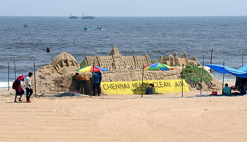 To increase environmental awareness Green Peace International NGO has created a sand art drawn by a Odisha based artist Subala Maharana at Elliots Beach. (Photo | Martin Louis, EPS)