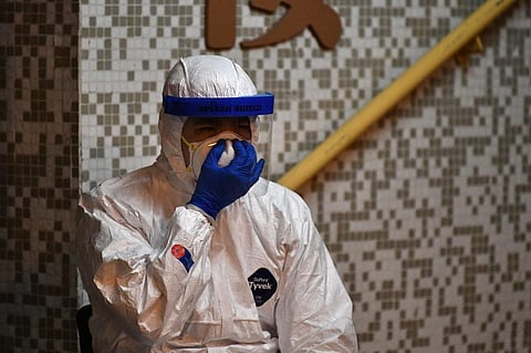 Image used for representation | A medical personnel wearing a protective suit to safeguard himself from coronavirus. (Photo| AFP)