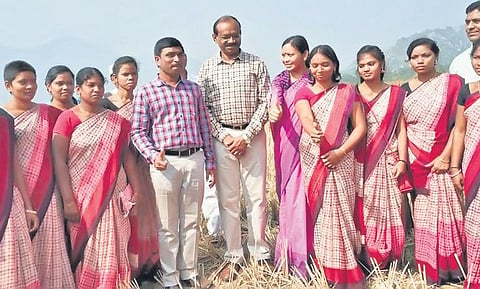 Bhudevi and team with chief minister’s additional secretary K Dhananjaya Reddy and Vizag JC L Shiva Shankar | Express