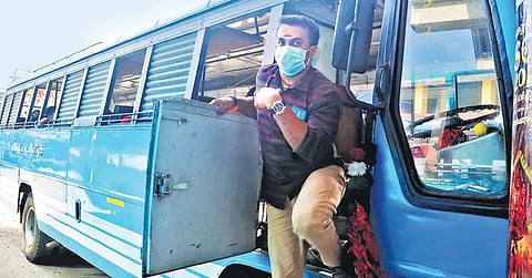 Driver Ratheesh Mohan comes out of Miyamol bus wearing a face mask. He says almost all drivers are now using face mask as instructed by the association.  (Photo | A Sanesh/EPS)