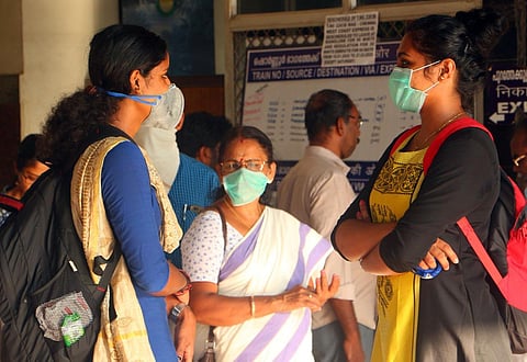 In the wake of coronavirus outbreak, people wear masks while travelling. (Photo| EPS/ TP Sooraj)
