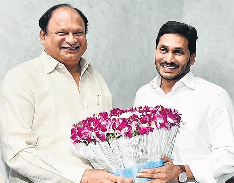 Chirala TDP MLA Karanam Balaramakrishna Murthy greeting Chief Minister YS Jagan Mohan Reddy at his camp office in Tadepalli on Thursday |  Express