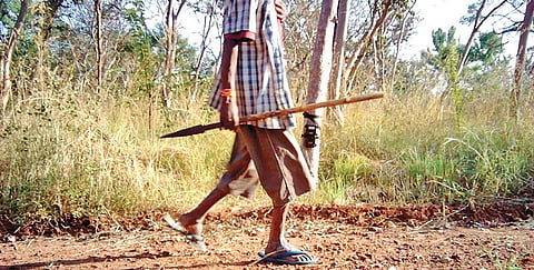 An image of a poacher caught on a camera trap
