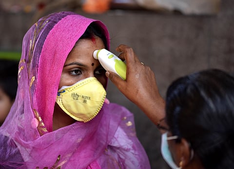 Thermal screening at Kapaleeswarar temple Mylapore ahead of coronavirus threat in Chennai on Tuesday. (Photo | R Satish Babu/EPS)