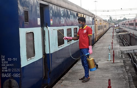 Train coaches being sanitized by workers due to Corona virus threat in Bhubaneswar. (Photo | Biswanath Swain, EPS)