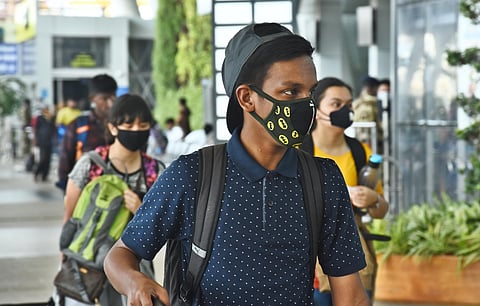 Passengers seen with face masks at the Airport after the coronavirus outbreak. (Photo | EPS, Ashwin Prasath)