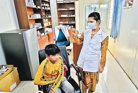 A boy being tested by a nurse at a Mohalla clinic (File photo | PTI)