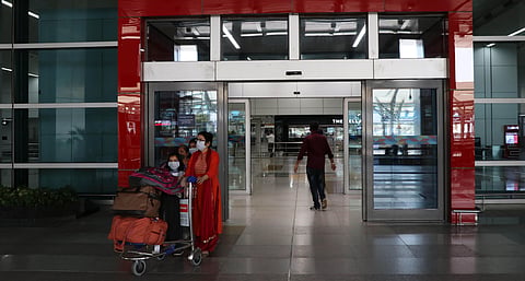 Passengers wearing protective mask to mitigate the spread of coronavirus arrive at Terminal 3 of IGI Airport in New Delhi on Monday, March 23 2020. (Photo | Ashish Kumar Kataria/EPS)