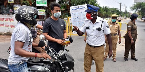 Most of bike-borne passengers who crossed Singanallur Junction was assaulted by police. (Photo | U Rakesh Kumar, EPS)