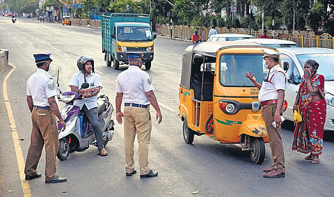 With curfew in place, police stop motorists near Spencer Plaza in Chennai on Thursday | R Satish Babu