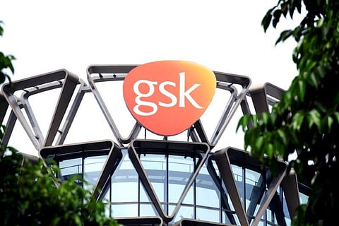 The GlaxoSmithKline (GSK) logo is seen on top of GSK Asia House in Singapore. (File photo| Reuters)