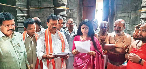 Sanchaita Gajapati Raju, daughter of Pusapati Ananda Gajapati Raju, being sworn in as Simhachalam temple Trust Board chairperson at Simhachalam in Visakhapatnam on Wednesday | Express