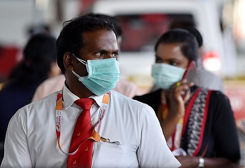Airport Staff wearing face mask to avoid Corona Virus at an Airport in  India. (Photo | R Satish Babu/EPS)