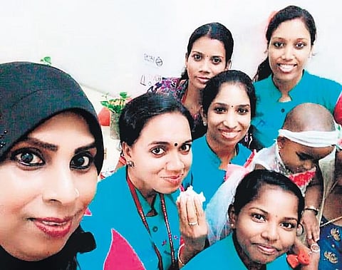 Ragaranjini along with her  co-workers at KMRL in Kochi