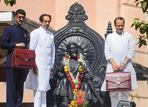 Maharashtra Chief Minister Uddhav Thackeray (second left) Deputy CM Ajit Pawar (R) and Minister of State for Home Shambhuraj Desai (L) arrive to present the State Budget 2020-21 at Maharashtra Assembly in Mumbai Friday March 6 2020. (Photo | PTI)