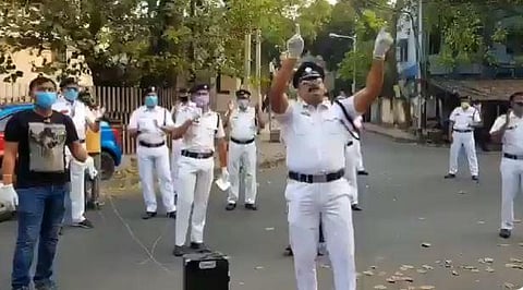 Kolkata police sing 'We shall overcome' amid coronavirus lockdown.
