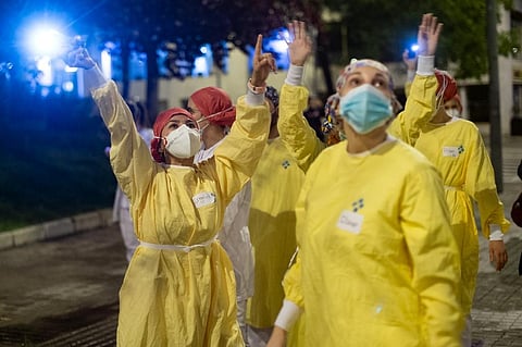 Medicos in Spain battling coronavirus. (Photo| AFP)