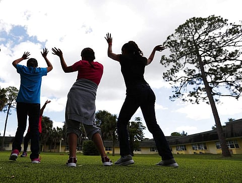 Girls dance as they do exercises (File Photo | AP)