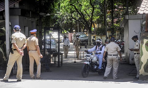 Mumbai Police personnel stand guard outside 'Matoshree' the private residence of Maharashtra Chief Minster Uddhav Thackeray in Mumbai  (Photo | PTI)